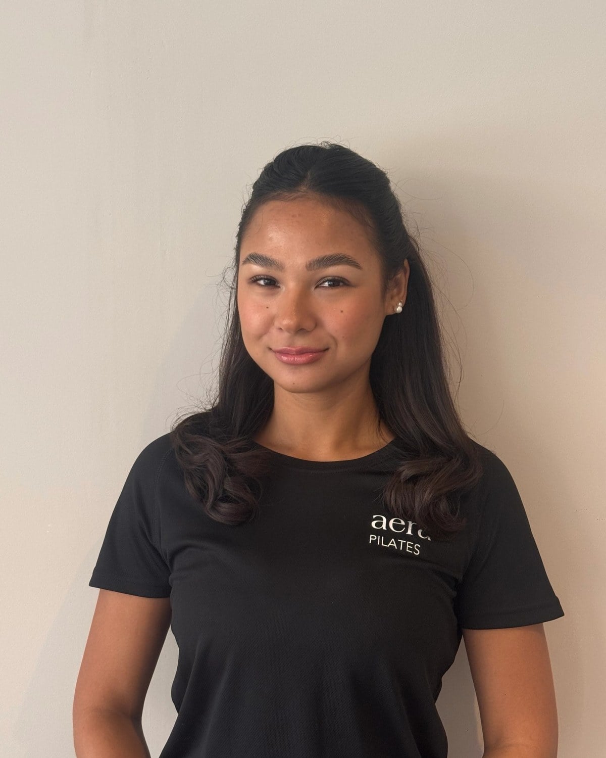 Portrait of Dakota, pilates instructor at aera